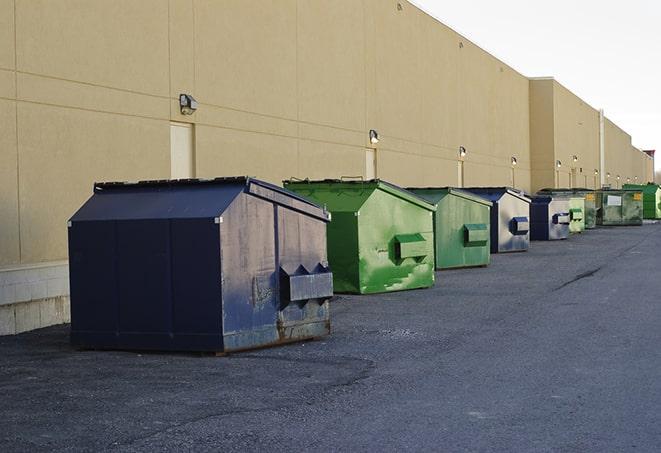 multiple dumpsters equipped for tough construction jobs in Norton